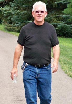 <Man walking with pedometer
